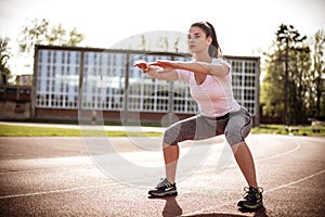 Booty exercise. Young woman.