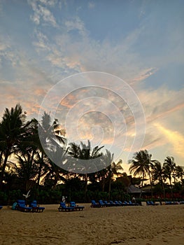Bophut beach and silhouettes of palms on Koh Samui in Thailand at sunset. photo