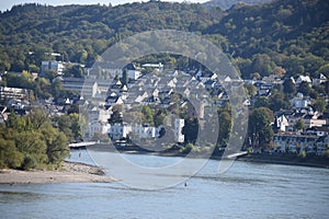 Boppard, Germany - 03 21 2020: Rhine waterfont of Boppard with dry shoreline on the Filsen side