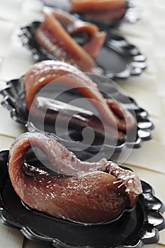 Boquerones en vinagre, spanish anchovies marinated in vinegar photo