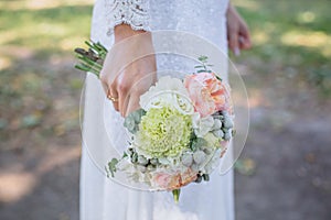 Boquet of flowers in bride hand