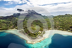 Bora Bora, aerial view from Island with Mount Otemanu, forest, beach and coral reefs. French Poynesia, South Pacific Ocean. photo
