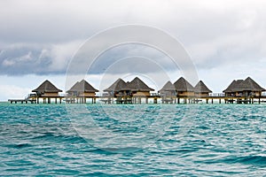 Bora Bora overwater-bungalows  of Bora Bora, luxury resort, hotel, bright blue water