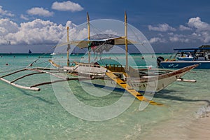 BORACAY, PHILIPPINES - FEBRUARY 1, 2018: Bangka boats at the White Beach at Boracay island, Philippin