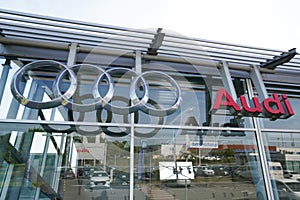 Audi wall dealership car sign text and brand logo shop German automobile manufacturer