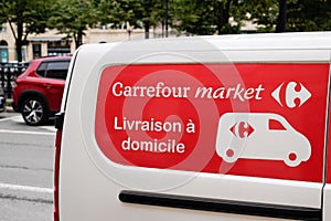 Bordeaux , Aquitaine / France - 06 14 2020 : Carrefour market logo sign supermarket on delivery van to deliver sall at home