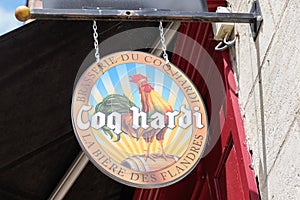 Coq hardi beer sign logo on restaurant bar wall Belgian flanders beers