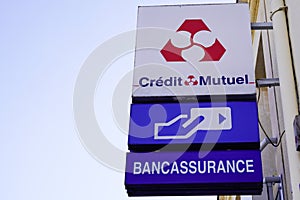 Credit mutuel french bank insurance text logo and brand sign atm office front signage