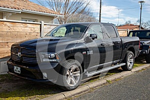 Dodge Ram 1500 HEMI 5.7 liter Pickup car with logo brand and text sign truck