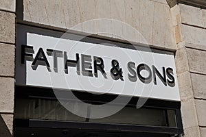 Father & Sons wall facade entrance brand logo with text sign entrance facade store