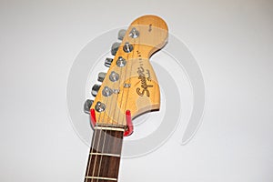 Fender squier strat Guitar brand logo and text sign electric guitar head detail