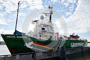 Greenpeace logo sign on boat vessel the Arctic Sunrise in Bordeaux harbour France