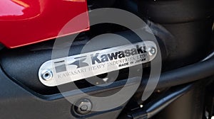 Kawasaki text brand of japanese motorcycle sign logo on japan motorbike detail