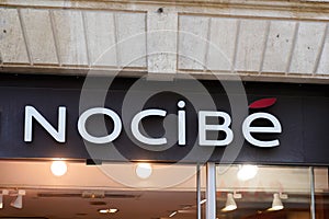 Nocibe logo brand and sign in front of store perfumery and beauty salon shop