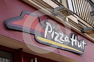 Pizza Hut Sign text and Logo of Fast food Casual pizzas Restaurant