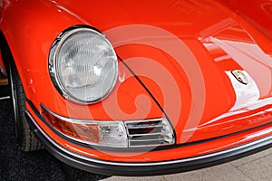 Porsche 911 classic sport vintage car iconic front headlight and logo sign text brand