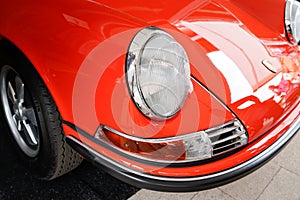 Porsche 911 classic sport vintage car iconic front headlight red orange racing vehicle