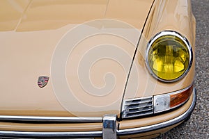 Porsche 911 logo brand and text sign classic sport vintage car iconic front headlight