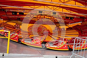 rafale carousel amusement merry-go-round for children with a futuristic look red photo