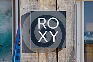 roxy text logo shop and brand sign of women fashion surf girls store clothing