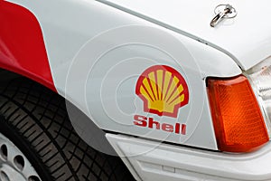 Shell brand petrol fuel company text and logo sign on racing old vintage car rally