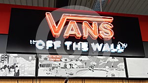 Vans logo text and brand sign for fashion store us footwear shoes apparel company