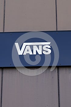 Vans shop sign text and logo store of american footwear shoes apparel company