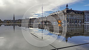 BORDEAUX, FRANCE - NOVEMBER 20, 2021: The mirror of the quay in front of the Place Royale Place de la Bourse