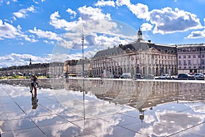 Bordeaux, France - Sep 17, 2021: Water Mirror, the world's largest reflecting pool on the quay of the Garonne river in