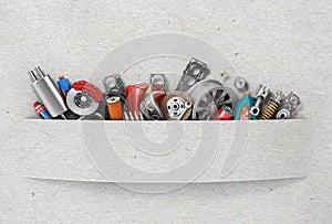 Border of auto parts on paper background