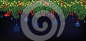 Border with Christmas green branches, holly red berries on dark blue background. Christmas blue balls hanging on tree