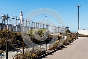 Border Fence with Lighthouse and Security Tower