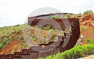 Border Fence Separating the US from Mexico Near Nogales, Arizona photo