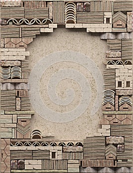 Border frame on the background of a sandy clay wall with decorative stonework. ÃÂ¡opy space.