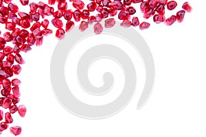 Border of fresh ripe pomegranate seeds