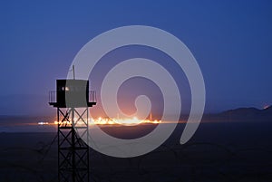 Border guard tower at night