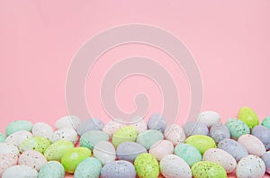 Border of pastel speckled easter eggs