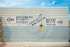 Border sign, showing distance to Jerusalem and Beirut, in Rosh Hanikra - popular tourist site in Israel