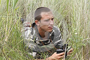 A border war is looking through binoculars