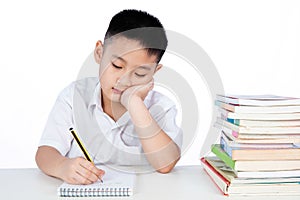 Bored Asian Chinese Little Boy Wearing Student Uniform Writting