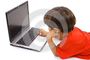 Bored Boy using Laptop