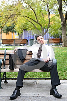 Bored Business Man on Bench