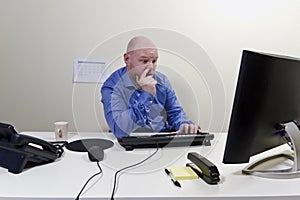 Bored Businessman picking Nose