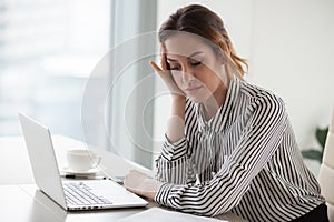 Bored businesswoman tired of monotonous job disinterested in dull work