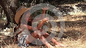 Bored Child Playing in Olive Orchard Meditative Kid Little Girl Relaxing by Tree