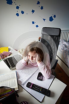 Bored Girl In Bedroom Using Laptop