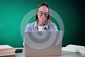 Bored Girl In Classroom Using Computer Technology