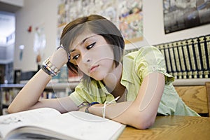 Bored High School Student In Library