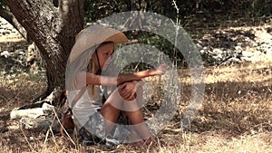 Bored Kid Playing in Olive Orchard by Tree, Meditative Child Outdoor in Nature, Little Girl Relaxing in Summer