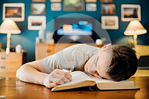 Bored lazy student at home studying.Online-only learning classes homework.Exam material understanding problem.Difficult